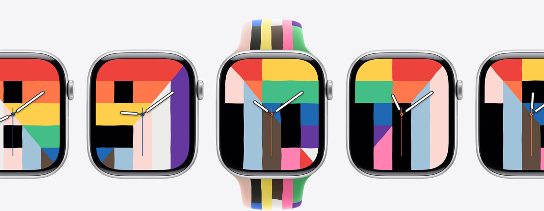 Plusieurs Apple Watch Series 10, cadran Fierté et harmonie, formes rectangulaires, triangulaires et trapézoïdales en plusieurs couleurs unies, dont celles de l’arc-en-ciel, dessinant les chiffres des heures, montre centrale fixée au bracelet sport édition Fierté, six bandes formées de minces rectangles de différentes teintes unies, dont celles de l’arc-en-ciel, bords légèrement irréguliers