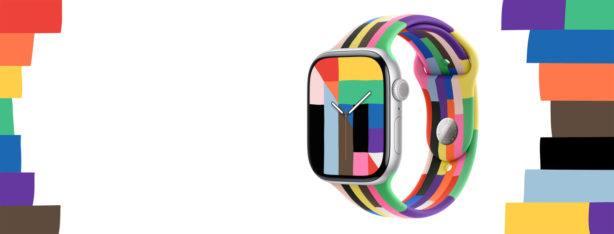 Apple Watch Series 10, boîtier en aluminium argent, Digital Crown, cadran Fierté et harmonie, formes rectangulaires, triangulaires et trapézoïdales en plusieurs couleurs, dont celles de l’arc-en-ciel, dessinant le nombre 10, aiguilles indiquant l’heure, fixée au bracelet sport édition Fierté, six bandes formées de minces rectangles de différentes teintes unies, dont celles de l’arc-en-ciel, bandes unies arborant différentes formes et couleurs de l’arc-en-ciel de chaque côté de la montre